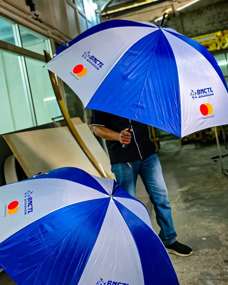 Branded umbrellas — Planet Printing, Dili