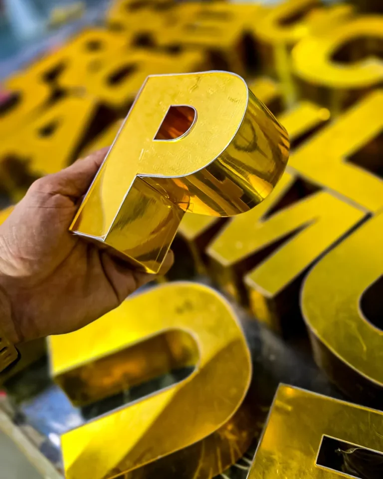 Cut metal letters with gold finish — Planet Printing, Dili