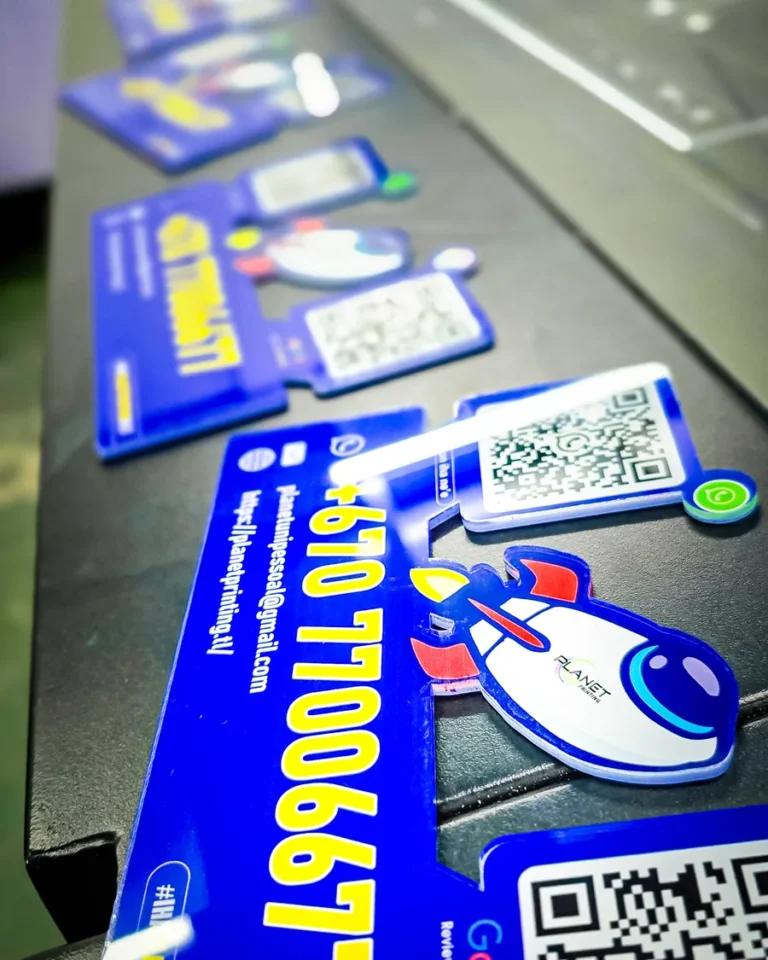 UV-printed acrylic signs and QR stands — Planet Printing, Dili